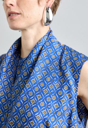 Блузка без рукавов