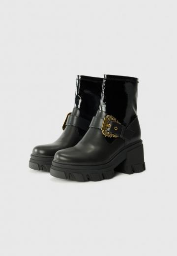 Высокие сапоги