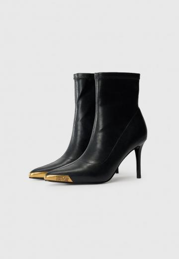 Высокие сапоги