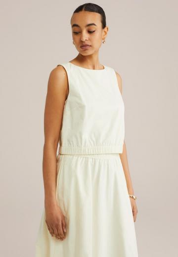 Блузка без рукавов