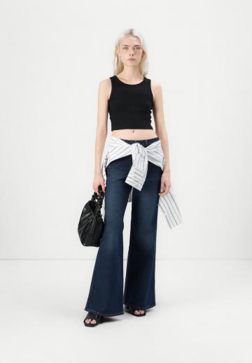 Клешеные джинсы