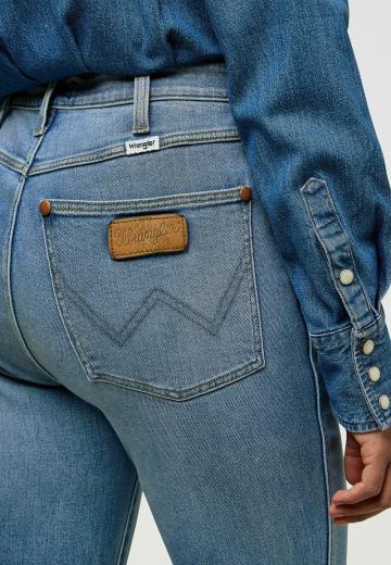 Клешеные джинсы