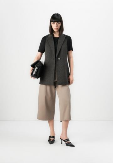 Длинный жилет