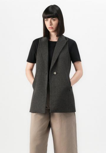 Длинный жилет