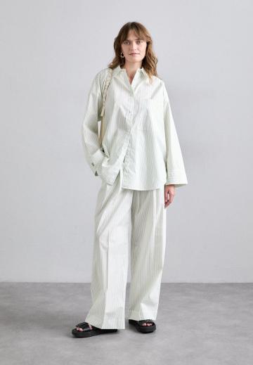 Длинная блузка