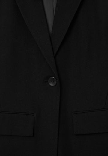 Длинный жилет