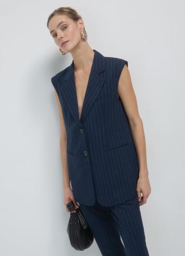 Длинный жилет