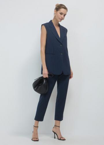 Длинный жилет