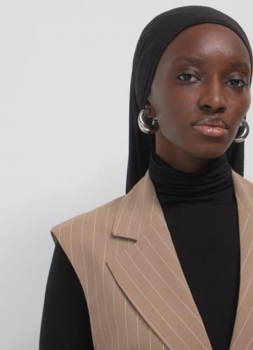 Длинный жилет