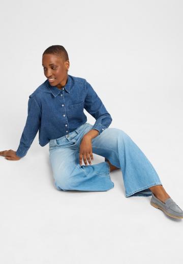 Клешеные джинсы