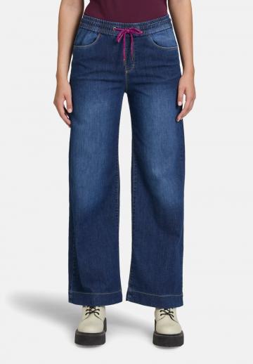 Клешеные джинсы