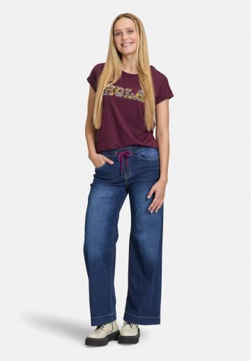 Клешеные джинсы