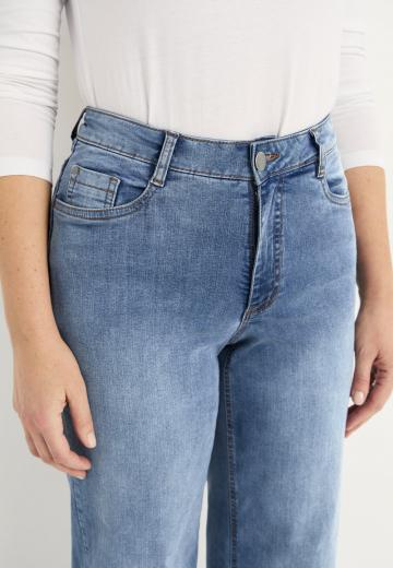 Клешеные джинсы