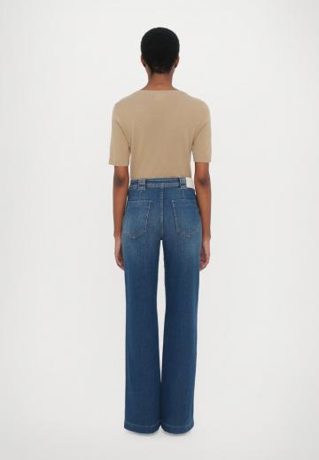 Клешеные джинсы