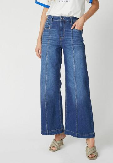 Клешеные джинсы