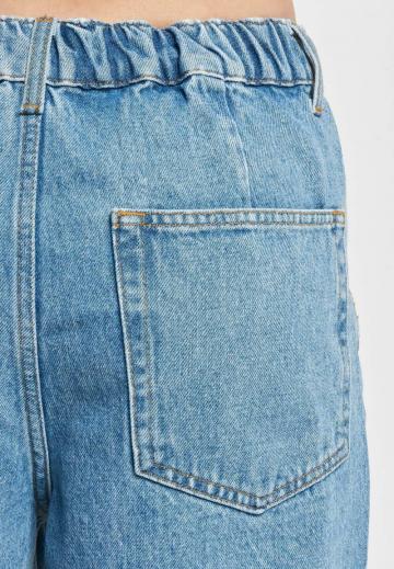 Клешеные джинсы