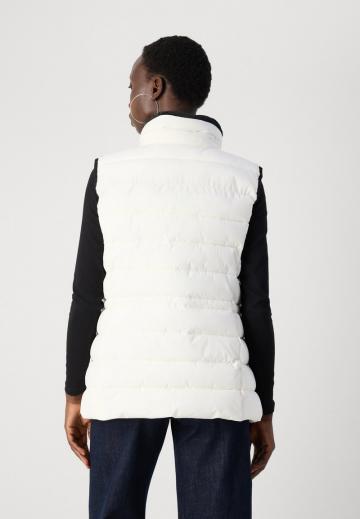 Длинный жилет