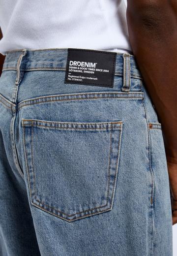 Клешеные джинсы