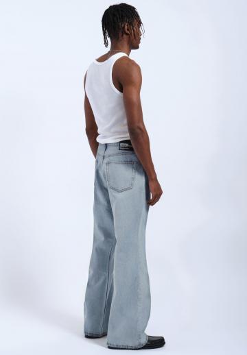 Клешеные джинсы