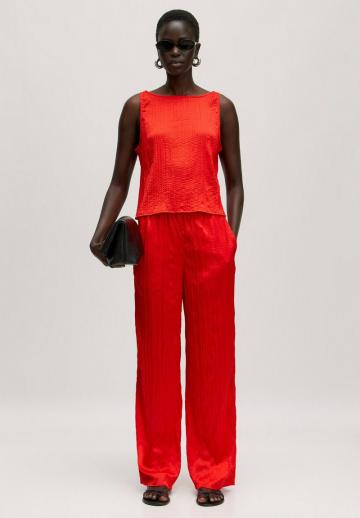 Блузка без рукавов