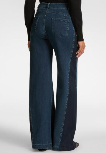 Клешеные джинсы