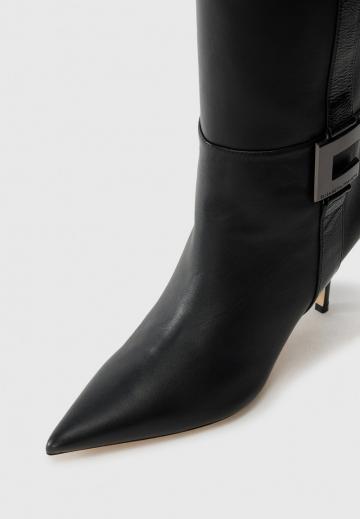 Высокие сапоги