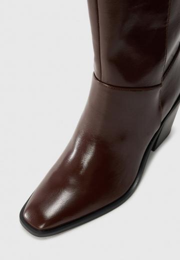 Высокие сапоги