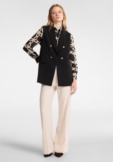 Длинный жилет