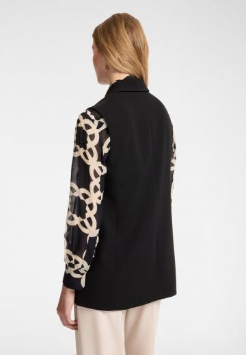 Длинный жилет