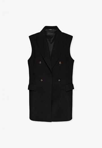 Длинный жилет