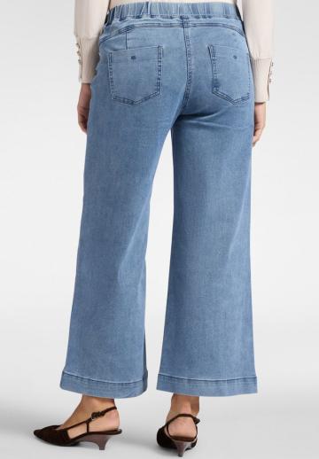 Клешеные джинсы