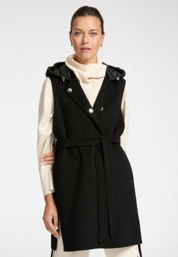 Длинный жилет