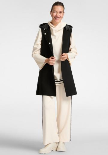 Длинный жилет