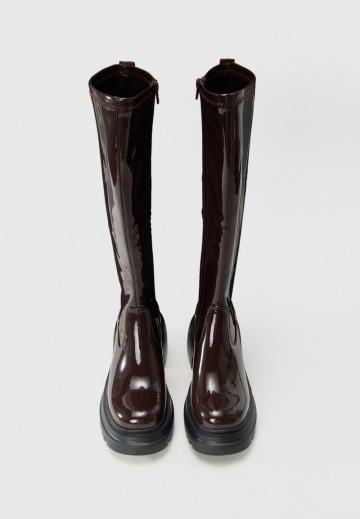 Высокие сапоги