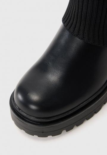 Высокие сапоги