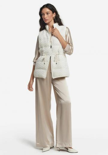 Длинный жилет