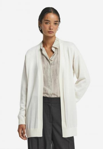 Длинный жилет