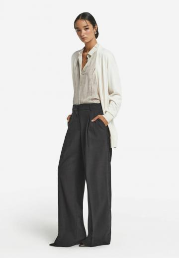 Длинный жилет