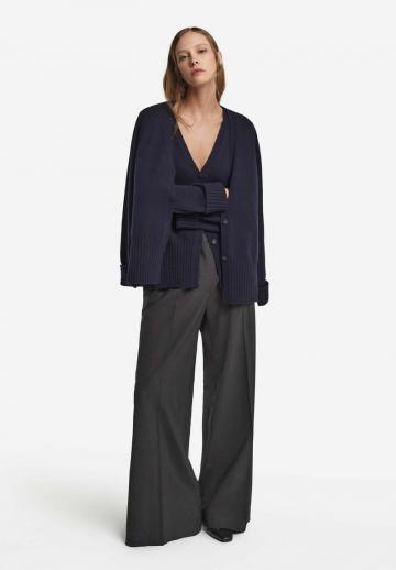 Длинный жилет