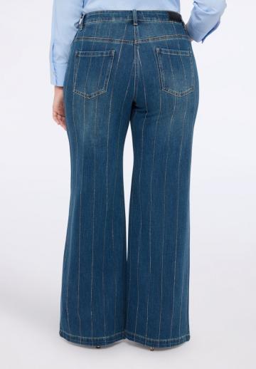 Клешеные джинсы