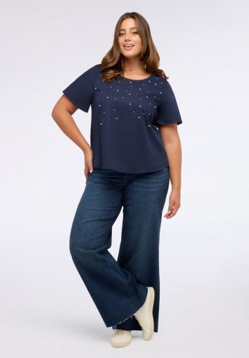 Клешеные джинсы