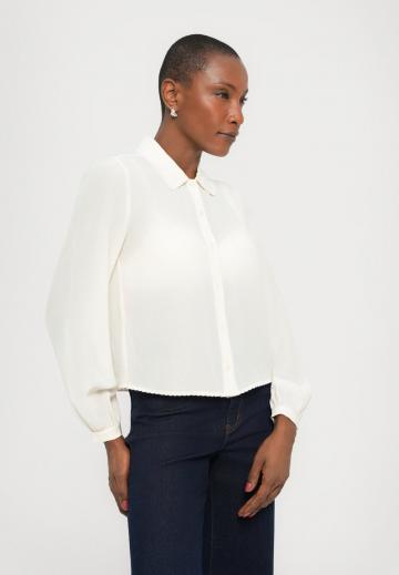 Клешеные джинсы