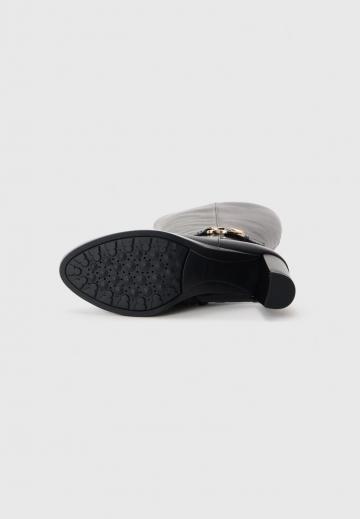 Высокие сапоги