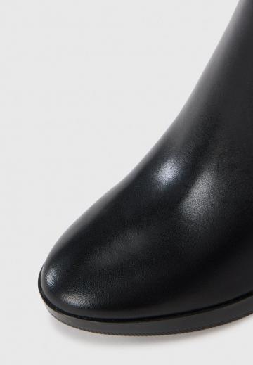 Высокие сапоги