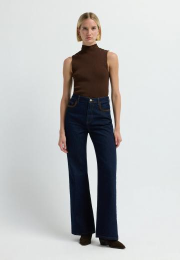 Клешеные джинсы