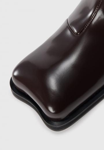 Высокие сапоги