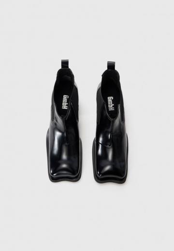 Высокие сапоги