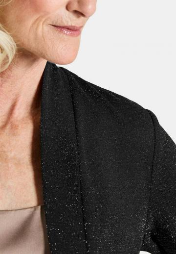 Длинный жилет