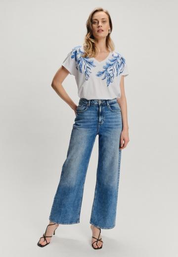 Клешеные джинсы