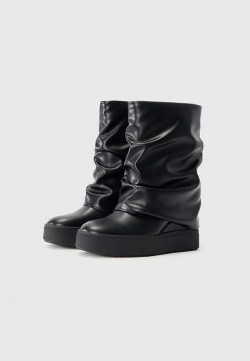 Полусапожки на высоком каблуке